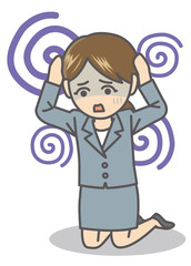 頭を抱える女性