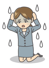 頭を抱える女性