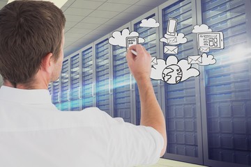 Businessman drawing in the server room