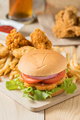 Fast food hamburger with set fried chicken and french fries.