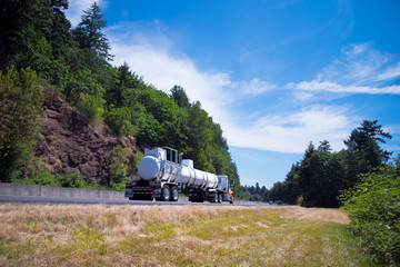 Semi truck drive tank trailer for chemical materials on road