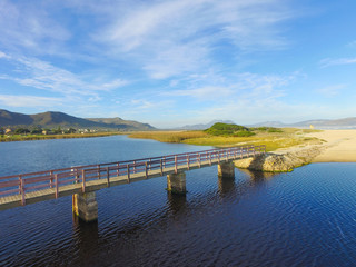 Bridge over the Lagoon by the Ocean