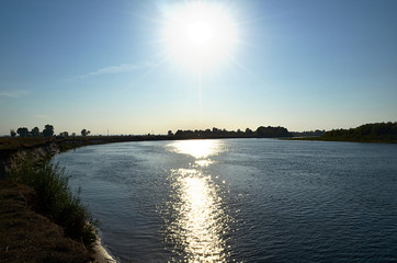 The river bank under the white sun