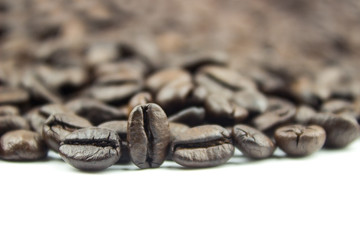 Roasted coffee beans on isolated white background