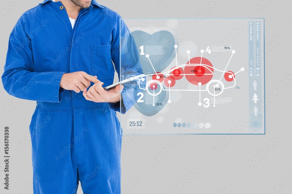 Wall mural mechanic using a tablet close to an interface