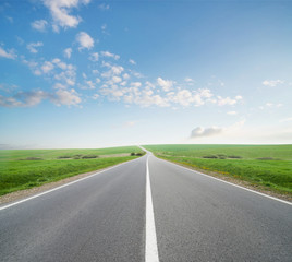 Road and cloudy sky. Beautiful natural concept and idea of travel