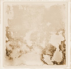 Vintage wall detail in retro style for texture or background. Sepia tones and faded borders.