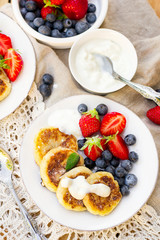 Cottage cheese quark pancakes syrniki with fresh berries