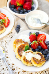 Cottage cheese quark pancakes syrniki with fresh berries