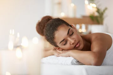 Poster Tender african girl resting relaxing with closed eyes in spa salon. © Cookie Studio