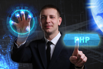 Business, Technology, Internet and network concept. Young businessman working on a virtual screen of the future and sees the inscription: PHP