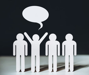 A group of people with a leader who expresses an original idea. Cloud of dialogue. Concept. Leader...