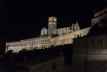 Fototapeta na wymiar Historical and mystical city of Assisi in Umbria central Italy, famous for the cathedral of San Francesco; Pilgrimage of faithful from all over the world and sacred place for Pope Francis