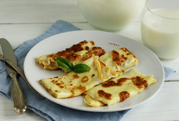 Tasty and healthy breakfast omelette from eggs on a white background.