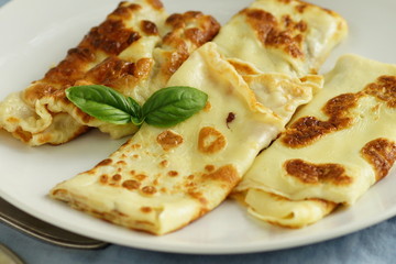Tasty and healthy breakfast omelette from eggs on a white background.close up