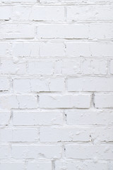 Background, texture brick wall, white color on the whole frame. Vertical frame