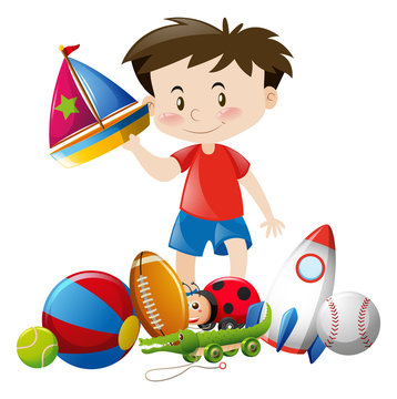 Boy playing with many toys