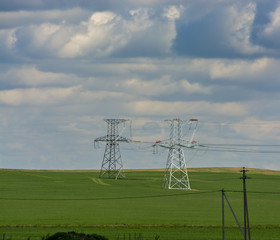 High-voltage power line against the sky and clouds 