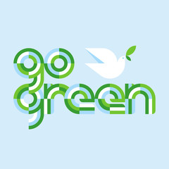 Earth day concept with go green lettering and white peace dove with olive branch