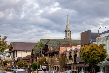 Street and architecture of Gramado city with Saint Peter Church Tower - Gramado, Rio Grande do Sul, Brazil