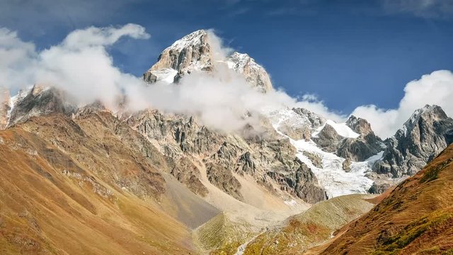 Nature magic. Fantasy-like morning. Global warming effect. 2K Timelapse of Ushba. Upper Svaneti, Mestia. Georgia, Europe. Caucasus. Virgin nature where no man feet was.