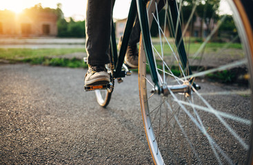 Riding bicycle at sunset