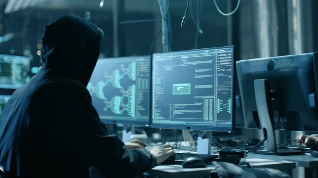 Nonconformist Teenage Hacker Girl Attacks Corporate Servers with Virus. Room is Dark, Neon and Has Many Displays and Cables. Shot on RED EPIC-W 8K Helium Cinema Camera.
