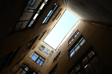 View of sky from courtyard.. Old courtyard.