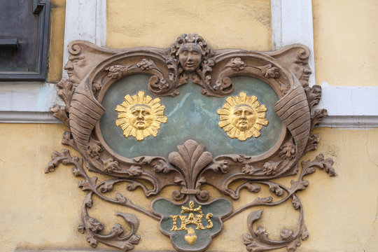 Relief on facade of old building,two suns, Nerudova street,  Prague, Czech Republic