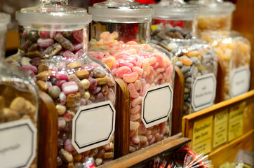 Filled glass candy jars at the fair.