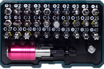 Set of screwdriver bits in box.