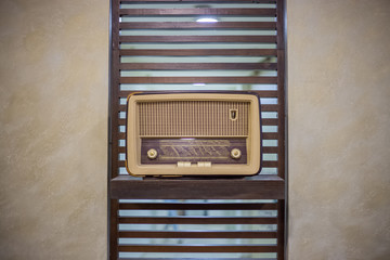 Preserved old radio on a shelf and beautiful environment