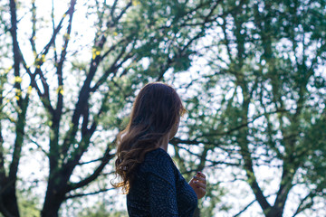 Young beautiful girl on a sunny day outdoors.