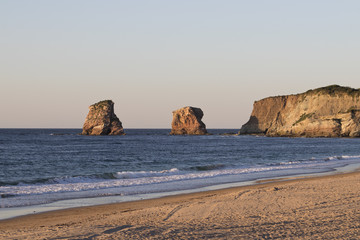 Les deux jumeaux (the twins rocks) rock formation at sunset (Hendaye, France).