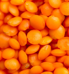 Red lentils as background. macro
