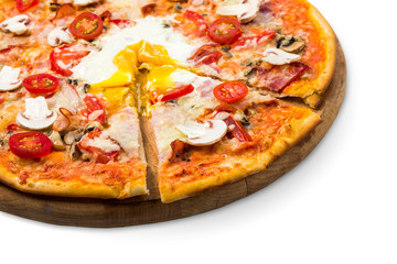 Delicious pizza with mushrooms, bacon and egg isolated