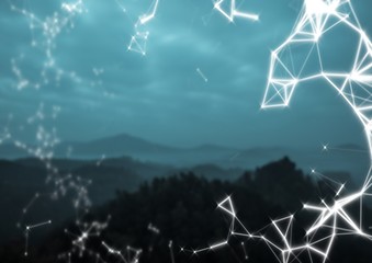 White network against mountains at night