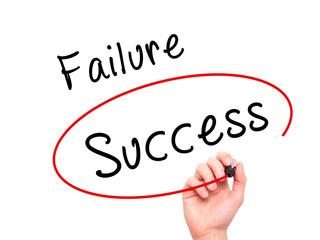 Man Hand writing and choosing, Success instead of Failure, with black marker on visual screen