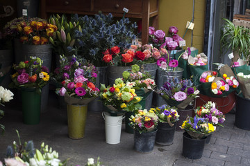 Fototapeta na wymiar variety of flowers near the flower shop for sale