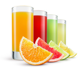 Isolated drinks. Glasses of fresh citrus juices (orange, grapefruit, lemon, lime) and cut fruits isolated on white background