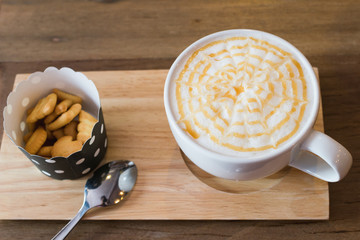 A cup of coffee is placed on the table.