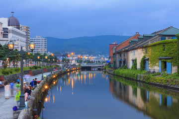 Fototapeta na wymiar Otaru, Japan historic canal and warehouse, famous tourist attraction of Sapporo, Hokkaido.