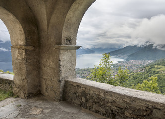 View of Lake Como and Gravedona through an Old Stone Arch
