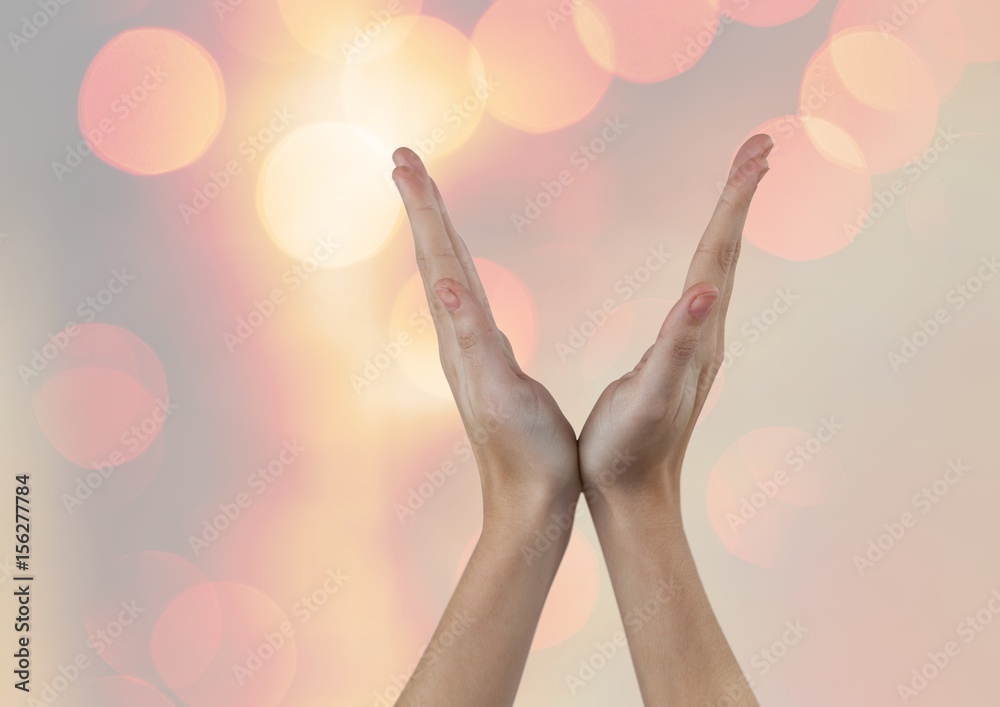 Poster hands in v shape with sparkling light bokeh background