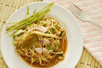 spicy slice bamboo shoot salad in Thai northeastern style on plate