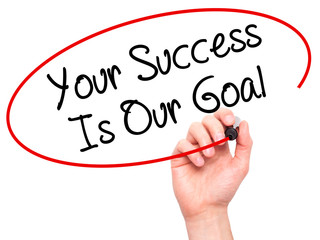 Man Hand writing Your Success Is Our Goal with black marker on visual screen
