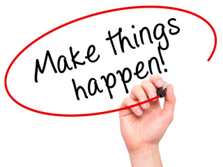 Man Hand writing Make Things Happen with marker on transparent wipe board