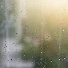 Natural water drops on glass window, Selective focus