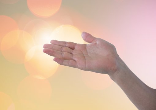 Hand Posture With Sparkling Light Bokeh Background