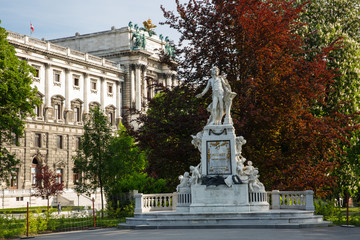 Fototapeta na wymiar Statue of Wolfgang Amadeus Mozart, spring. Burggarten, Vienna, Austria